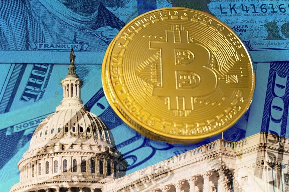 A gold bitcoin above the U.S. Capitol building